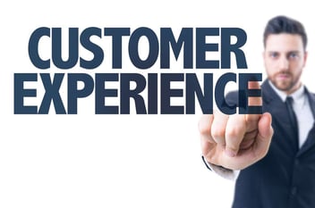 Business man pointing the text Customer Experience