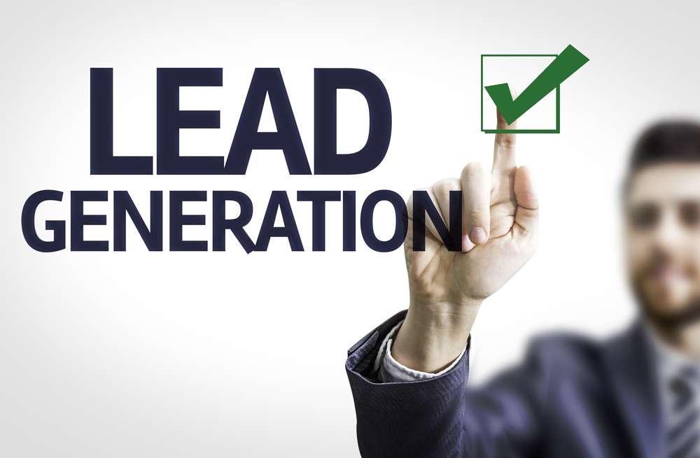 Business man pointing the text Lead Generation